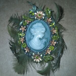 Elegant Green Cameo Brooch with Floral Accents
